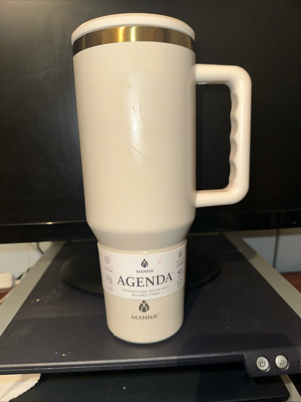 Anna White Stainless Steel Travel Mug with Handle and Gold Accent